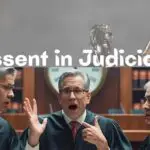 Judges engaged in discussion representing dissent in the judiciary